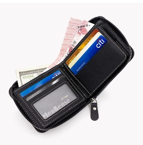 Detailed interior of a men's zip-around wallet featuring card slots and bill compartment