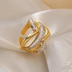 Gold-plated open ring featuring a crisscross design with pavé set white cubic zirconia