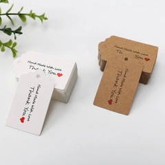 Brown and white kraft paper gift tags with Thank You and Hand Made With Love text