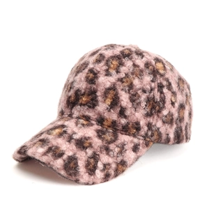 Detail view of pink leopard print baseball cap in warm fleece for autumn and winter