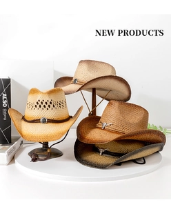 Detail view of woven western cowboy straw hats with vintage metal buckles and sunshade design