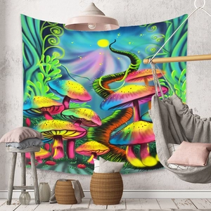 Detail of psychedelic mushroom tapestry on wall with bohemian home decor accents