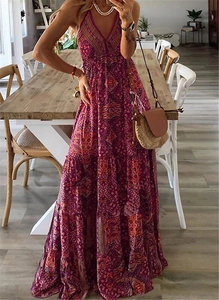 Detail showing Bohemian floral print and multi-layered ruffled skirt on a purple V-neck dress