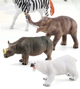 Detailed group of realistic wild animal figures including elephant and zebra models