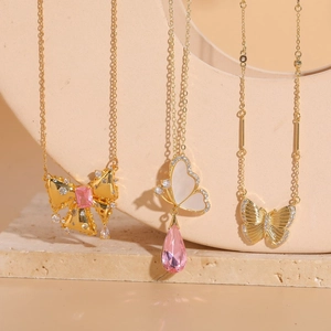 Luxury butterfly pendants with pink crystals and shell inlay on fine gold chain necklaces