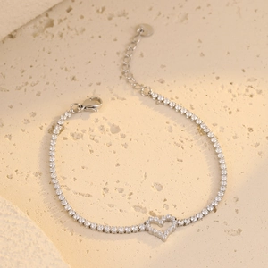 Elegant S925 sterling silver heart tennis bracelet with white zircon in a 45-degree angle