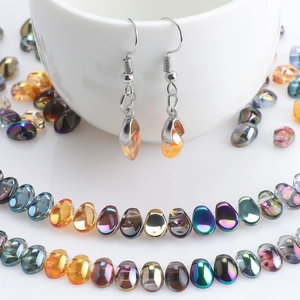 6x12mm crescent crystal pendants and earrings in amber and assorted glass beads