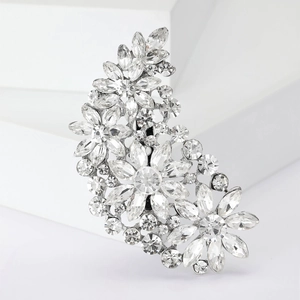 Detailed view of vintage alloy floral brooch featuring sparkling clear crystals and rhinestones