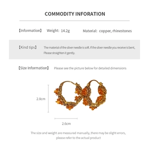 Detail view of 2.8cm gold plated floral hoop earrings with sparkling rhinestones for women