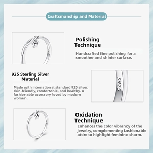 Macro detail of 925 sterling silver ring showing the engraved S925 hallmark and paw charm