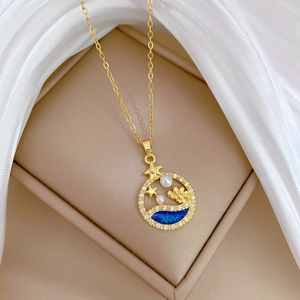 Luxurious gold titanium steel necklace with blue enamel pendant and sparkling zircons