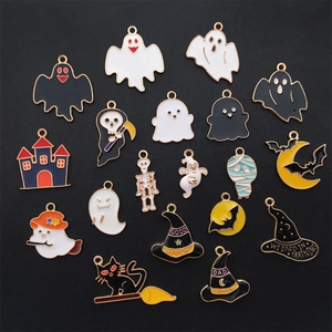 Detailed close-up of colorful Halloween enamel charms including ghosts, bats and wizard hats
