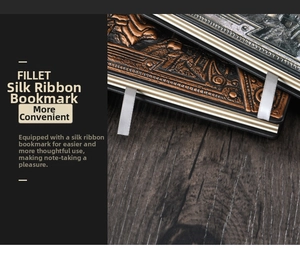 Detail showing high-quality 3D embossed dragon cover and gray ribbon bookmark of notebook