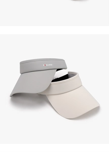 Macro view of two adjustable sun visors in grey and cream with reinforced edges
