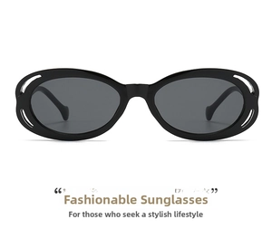 Detail view of oval cat-eye sunglasses with streamlined cutout design on black frames