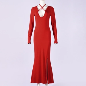 Detail of red slim fit dress showing lace-up U-neckline and high slit on the side