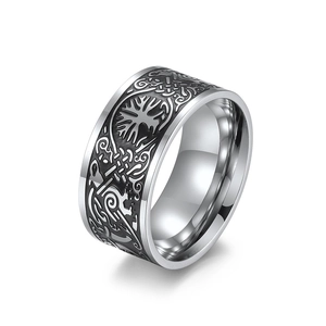 Vintage stainless steel Tree of Life Viking ring with black embossed details on a wide band