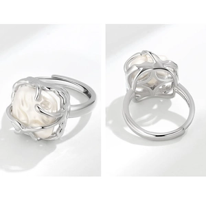 Detail view of silver French vine ring with baroque pearl and adjustable open band