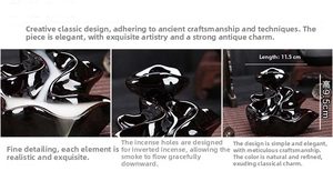 Detailed view of backflow incense burner showing 11.5cm by 9.5cm dimensions on ceramic