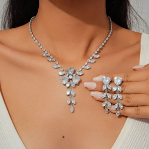 Luxury zircon heart and leaf jewelry set with necklace and earrings on a female model