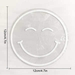 Detailed view of 12cm suncatcher window film with cracked texture and white smiley face