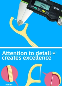 Detail showing 0.05mm ultra-fine dental floss diameter measured by a digital caliper
