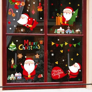 Weihnachtsfensterbilder mit Weihnachtsmann und Schneeflocken auf festlichen Glasscheiben