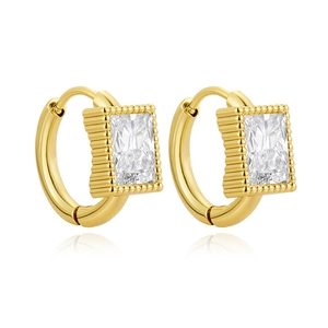 Detail of gold geometric earrings with rectangular clear stone and beaded metal border