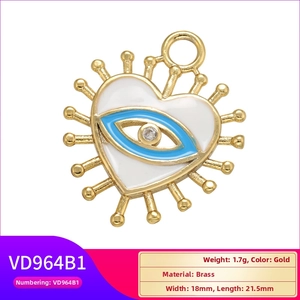 Λήψη macro από ορειχάλκινο μενταγιόν καρδιά 18mm x 21,5mm με μπλε μάτι σμάλτου