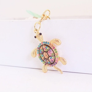 Portachiavi creativo a tartaruga in metallo dorato con strass multicolori