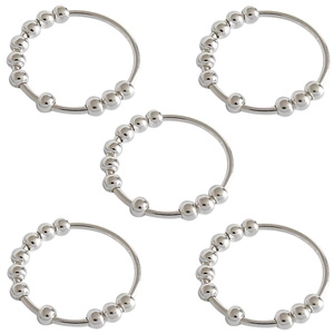 Macro view of five silver spinning rings with movable beads for anxiety relief