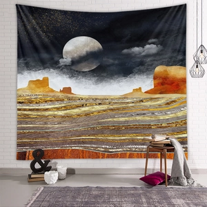 Close-up detail of moonlit desert tapestry hanging on a white brick wall in a cozy room