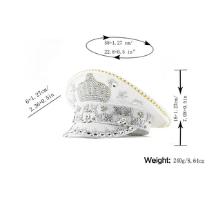 Detail view of white captain hat with rhinestone crown and sequin embellishments