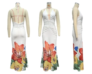 Detailed view of white floral print maxi dress featuring V-neck and ruched waist design
