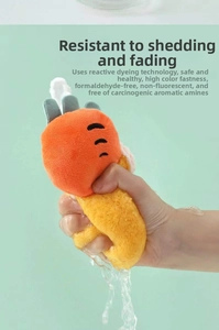 Detail showing high color fastness of carrot hand towel in water with no fading