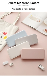 Macro shot of minimalist pastel macaron pencil cases in four matte aesthetic colors