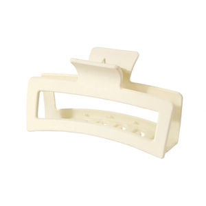 Macro side view of 13cm matte cream geometric hair claw clip with strong teeth
