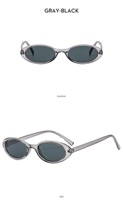 Front and side views of oval sunglasses in translucent gray frame with dark lenses