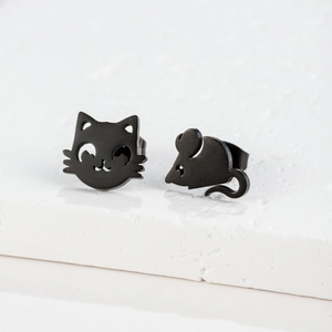 Detail of asymmetrical black metal earrings featuring cute hollow cat and mouse designs