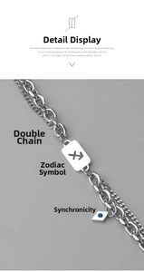 Detail of double-layer silver chain featuring a Sagittarius rectangle tag and blue gem charm