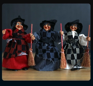 Three Halloween witch dolls with pointed hats and brooms for spooky hanging decoration