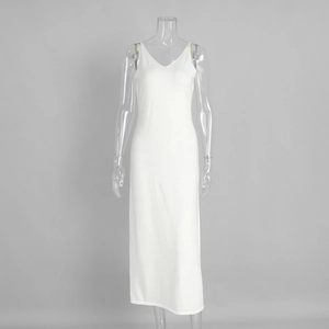 Detail of white V-neck slim-fit knitted long camisole dress with elegant drape texture