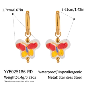 Detailed view of gold hoop earrings with colorful butterfly charms and size measurements