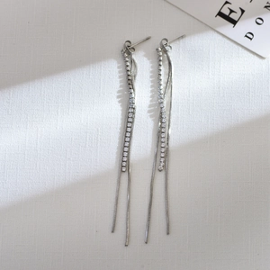 Silver geometric tassel earrings with glittering rhinestones and elegant snake chains