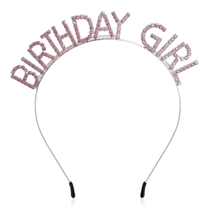 Close-up of silver metal headband with pink rhinestone Birthday Girl lettering detail
