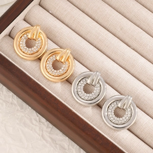 Minimalist hollow circle earrings with micro-inlaid diamonds in gold and silver finish