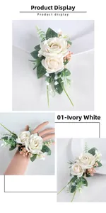 Detail of ivory silk rose corsage with pearls and delicate foliage for weddings