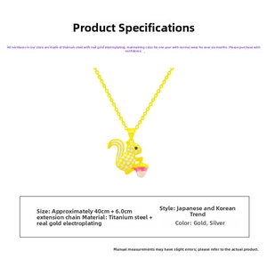 Macro detail of cartoon squirrel pendant with sparkling zircon and acorn drop