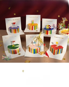 Detailed set of six 3D pop-up birthday cards with creative paper-cut cake designs