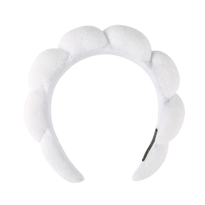 White puffy braided headband made of waffle microfiber fabric for skincare and washing face